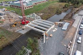 Structures Division: A Structures Division team has finished setting beams on one span of the SR443 bridge. 