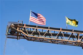Silver Hill Quarry: An American flag & H&K flag adorn one of the stackers at Silver Hill Quarry.