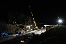 Structures Division: A Structures Division crew demolishes the existing Vera Cruz Road bridge.