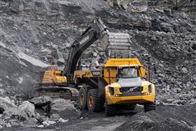 Wilkes-Barre Materials: Down in the pit, a Volvo EC750 excavator loads a Volvo A60H with shot rock.